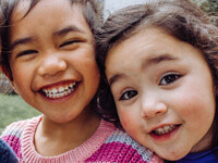 Two Young Girls Smiling